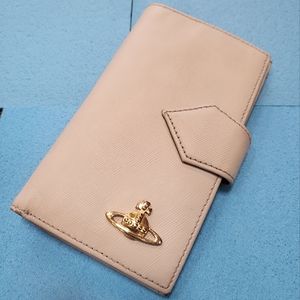 Vivienne Westwood wallet in creme and pink color